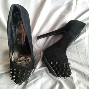 Black and silver spiked pumps